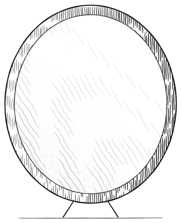 A round looking-glass propped up on two legs, facing outward, empty.