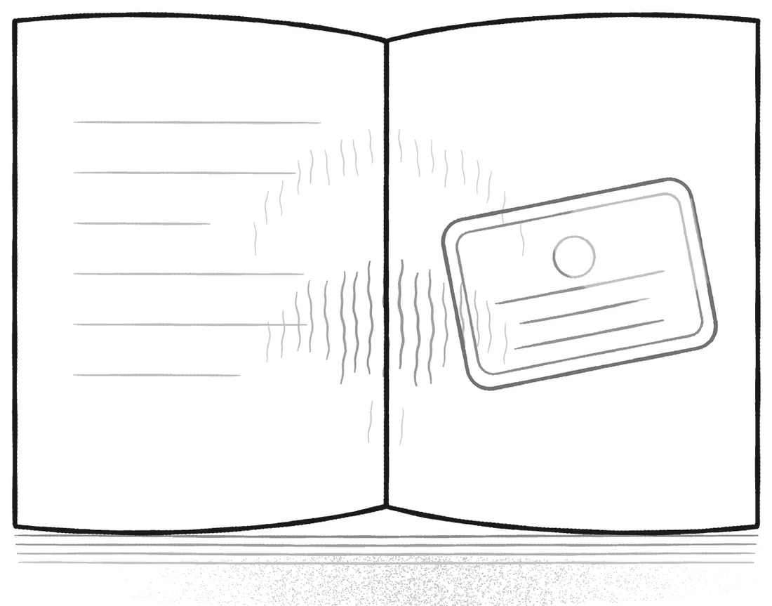 An open passport with a boarding pass tucked into the crease.