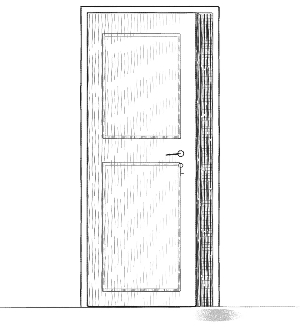 A panelled door, closed, with a round handle.