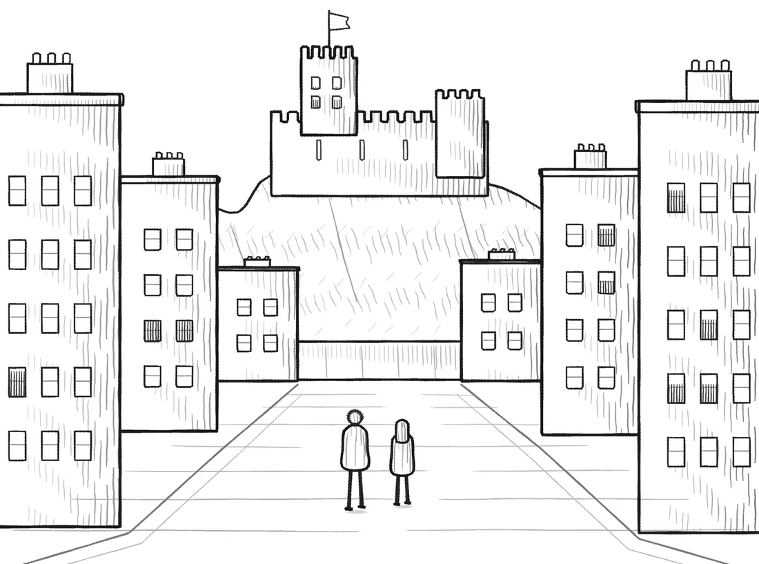 Two small figures on a wide street, walking towards a castle on the rock above the city.